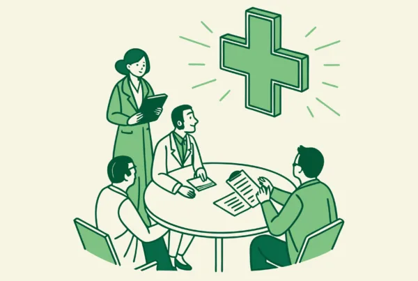 SovDoc healthcare M&A advisors collaborating around a table with a radiology symbol, representing radiology practice mergers and acquisitions consultation for medical groups.