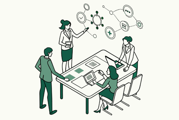 SovDoc healthcare M&A professionals collaborating around conference table discussing ENT medical practice mergers and acquisitions strategy, with holographic projection displaying medical and financial elements.