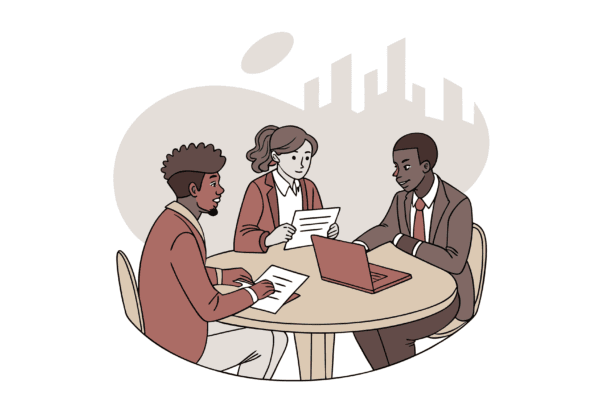 Diverse business professionals at a roundtable discussion about nephrology practice mergers and acquisitions, demonstrating SovDoc's collaborative approach to healthcare M&A advisory services.