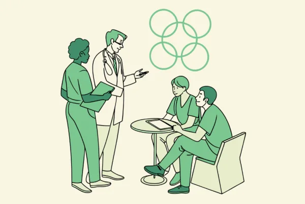 SovDoc financial advisor consulting with ENT physicians about healthcare practice mergers and acquisitions, showcasing the collaboration between financial planners and medical professionals in healthcare M&A.