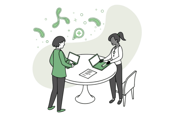 Healthcare M&A advisors collaborating around a table with medical imagery background - SovDoc roundtable discussion on gastroenterology and hepatology practice mergers and acquisitions