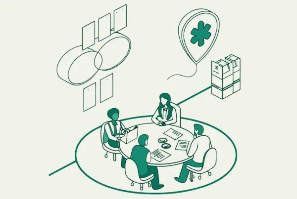 SovDoc advisory roundup illustration showing nephrology practice M&A experts discussing financial aspects of dialysis center acquisitions around a conference table with medical and financial elements, representing specialized healthcare merger and acquisition consulting.