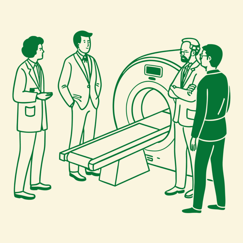 Business professionals gather around medical imaging equipment in a strategic discussion, representing SovDoc's expertise in radiology practice mergers and acquisitions and financing advisory services.
