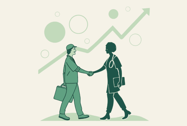 Two silhouetted figures shaking hands over rising graph, representing successful primary care practice mergers and acquisitions facilitated by SovDoc healthcare M&A advisors.