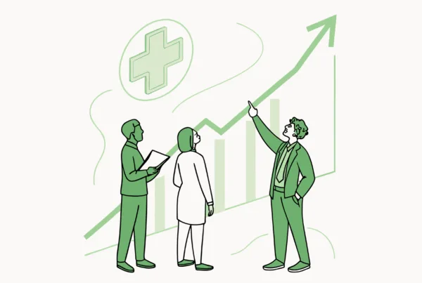 Business professionals discussing growth metrics for sports medicine clinic valuations. SovDoc healthcare M&A consultants analyzing performance therapy practice mergers and acquisitions opportunities.