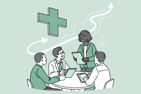 SovDoc healthcare M&A advisors collaborating around a table with hospice care symbolism, discussing auditing best practices for medical practice mergers and acquisitions in the hospice sector.