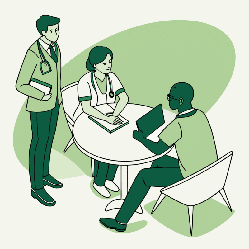 Business professionals and healthcare provider discussing palliative care practice mergers and acquisitions around a digital projection - SovDoc healthcare M&A advisory services supporting medical practice transitions.