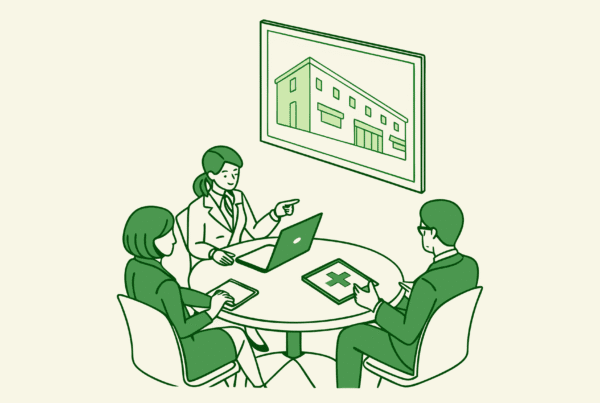 SovDoc healthcare advisors discussing compliance considerations in assisted living facility acquisitions during a strategic M&A roundtable meeting.