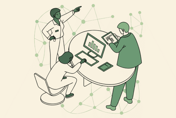 SovDoc healthcare M&A advisors collaborating on clinic-based ABA therapy practice integration data, analyzing EHR systems and financial performance during a medical practice merger consultation.