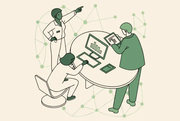 SovDoc healthcare M&A advisors collaborating on clinic-based ABA therapy practice integration data, analyzing EHR systems and financial performance during a medical practice merger consultation.